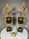 A pair vof Empire gilt and patinated bronze ewers attributed to Claude Galle