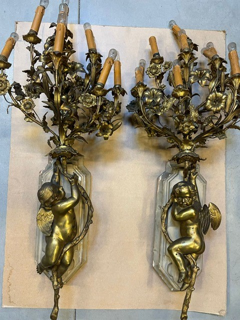 A palatial size pair of wall lights 