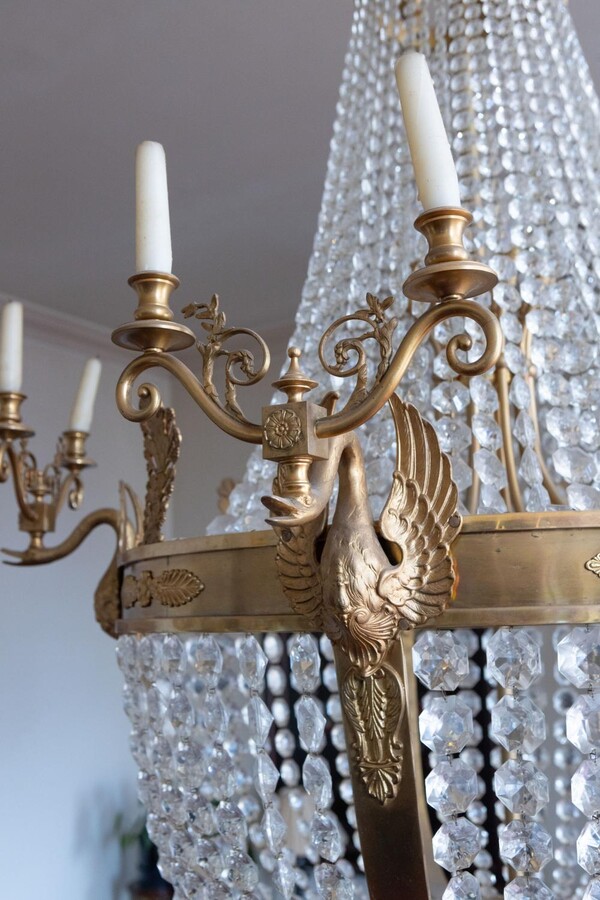 A palatial sze pair of crystal and bronze chandeliers 