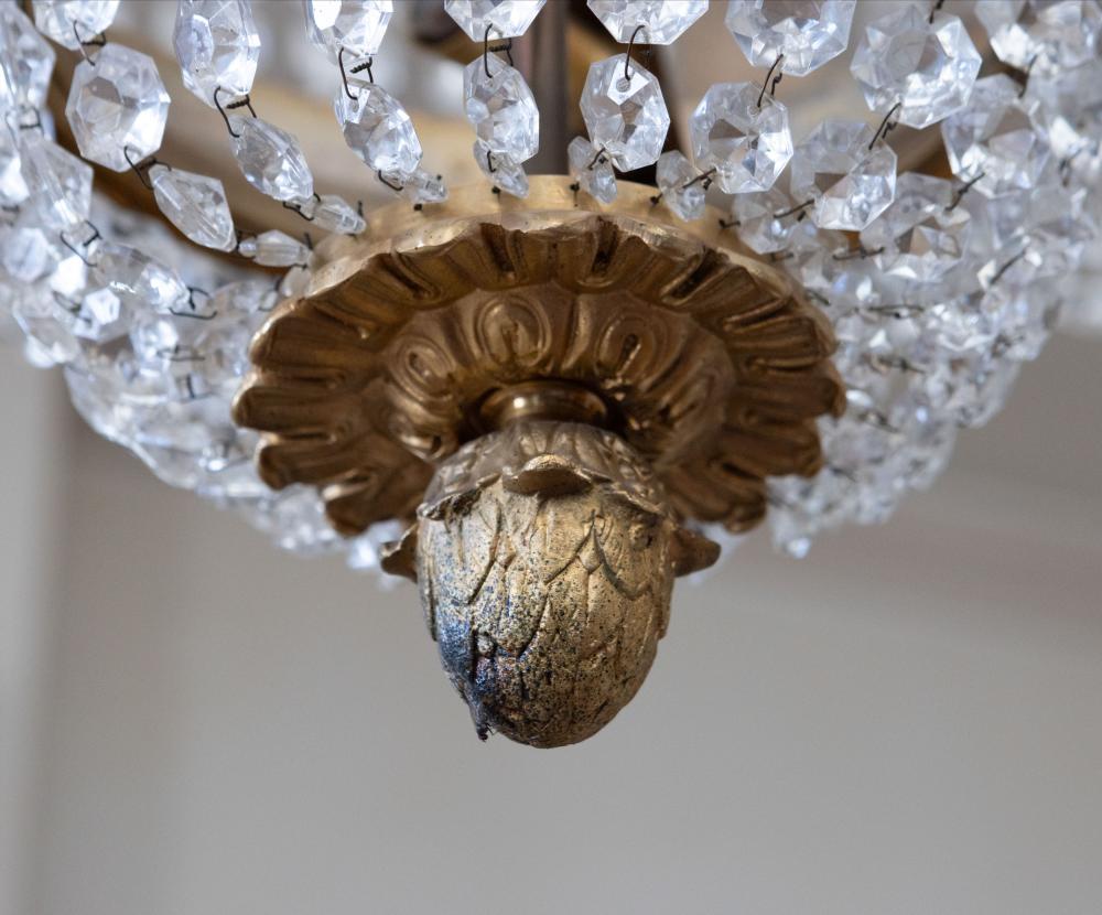 A palatial sze pair of crystal and bronze chandeliers 