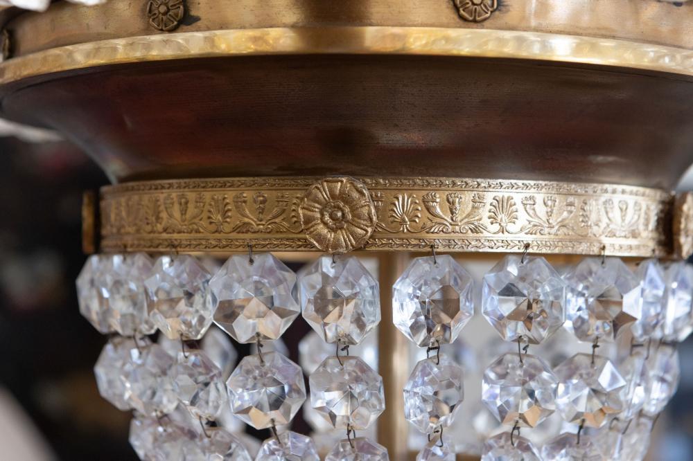 A palatial sze pair of crystal and bronze chandeliers 