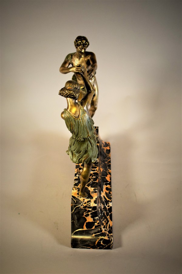 Art Deco Sculpture Bacchus playing Flute for a Dancing Nymph on a Portor Marble Base 