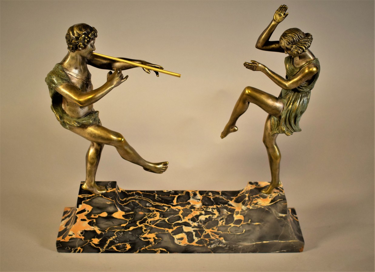 Art Deco Sculpture Bacchus playing Flute for a Dancing Nymph on a Portor Marble Base 